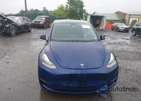 2023 Tesla Model Y from USA, damaged, VIN 7SAYGDEFXPF941604